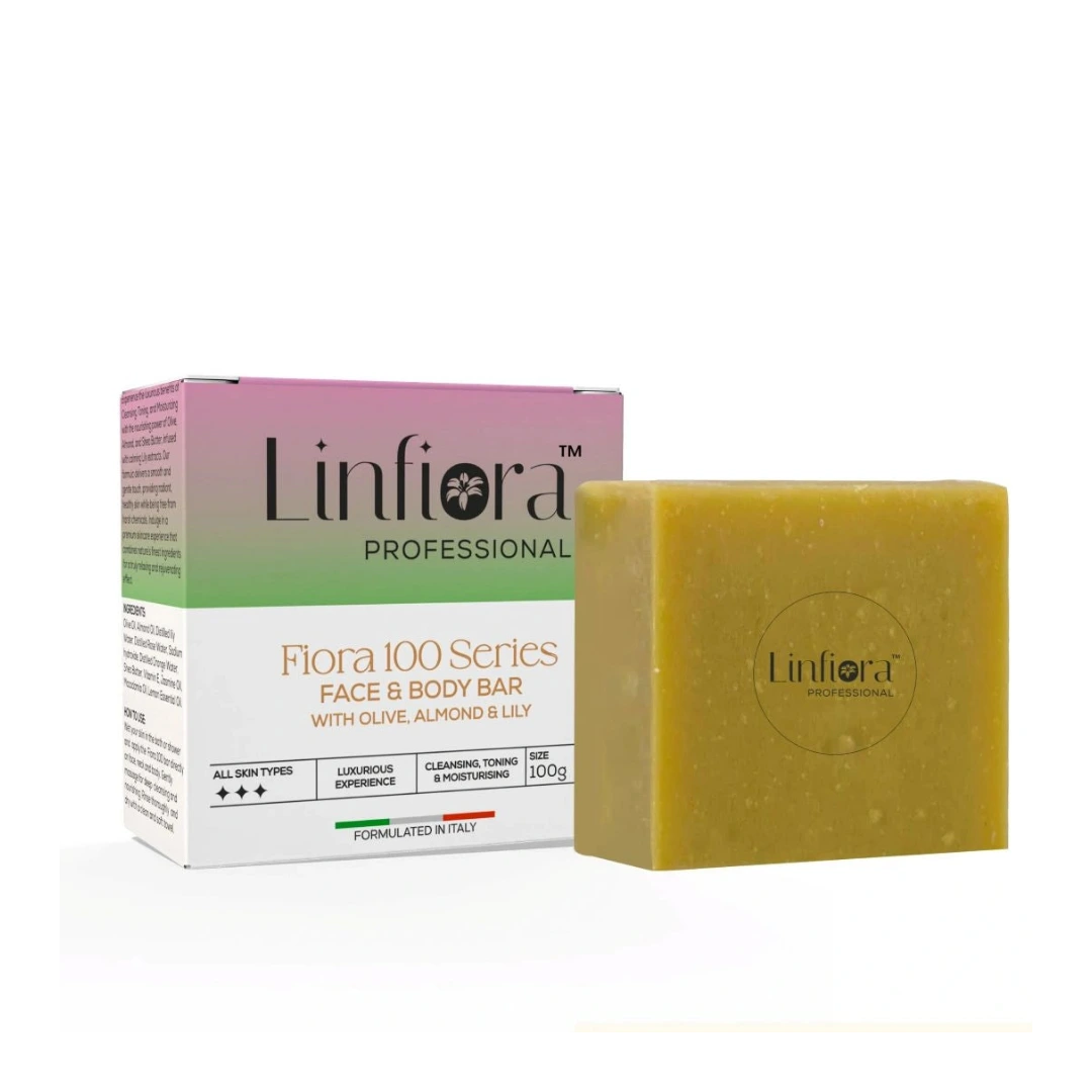 A bar of Linfiora Professional Flora 100 Series face and body soap in a yellow-green color, shown next to its pink, green, and white packaging box on a white background.
