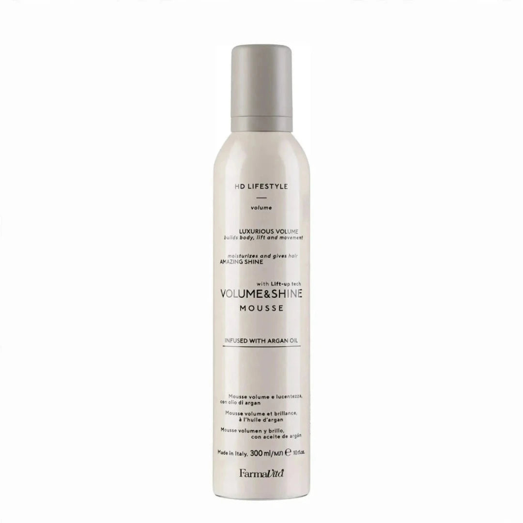 A tall white aerosol can of FurfuraLoud Volume & Shine Mousse on a plain white background.