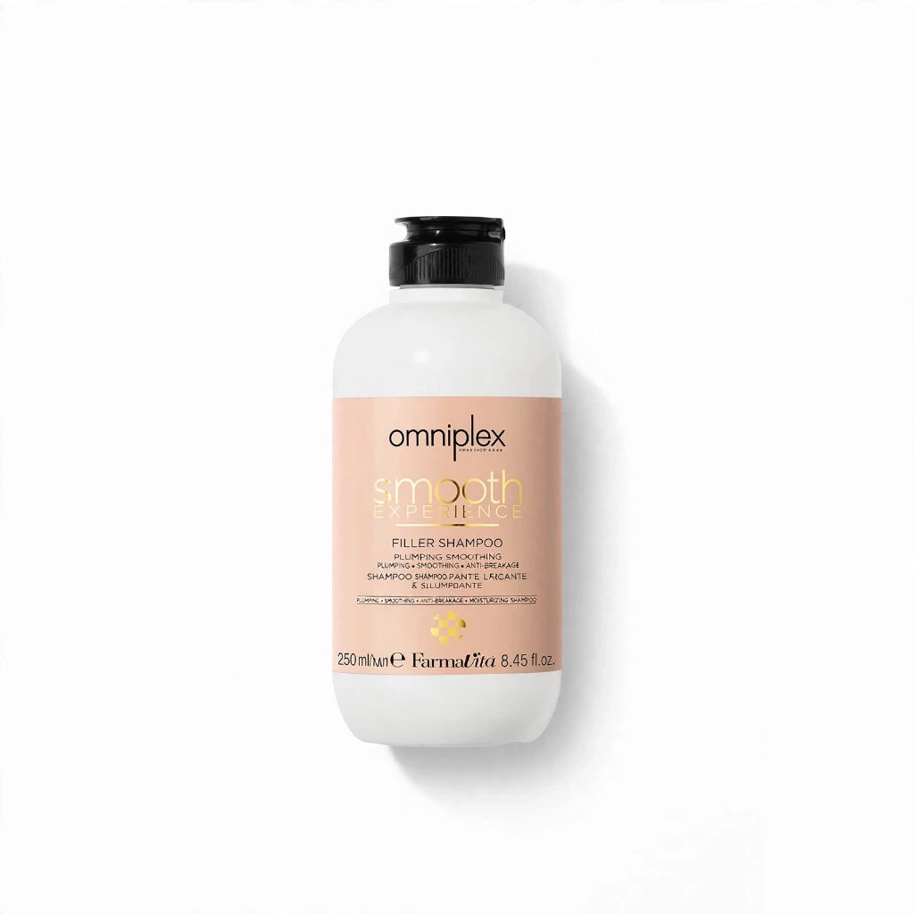 A 250ml bottle of omniplex smooth excellence Filler Shampoo, featuring a white bottle with a peach-colored label and a black cap, set against a plain white background with a soft shadow.